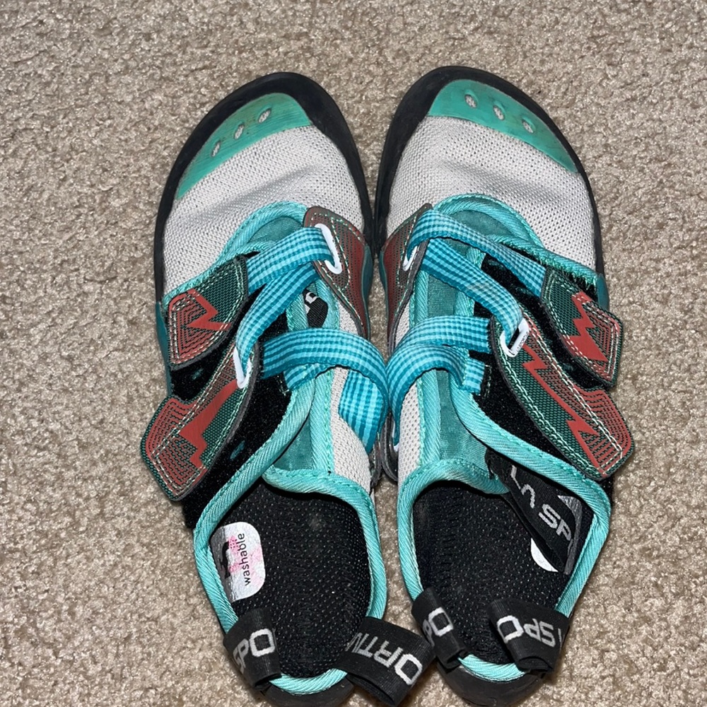 Selling used rock climbing shoes with brand new womens harness